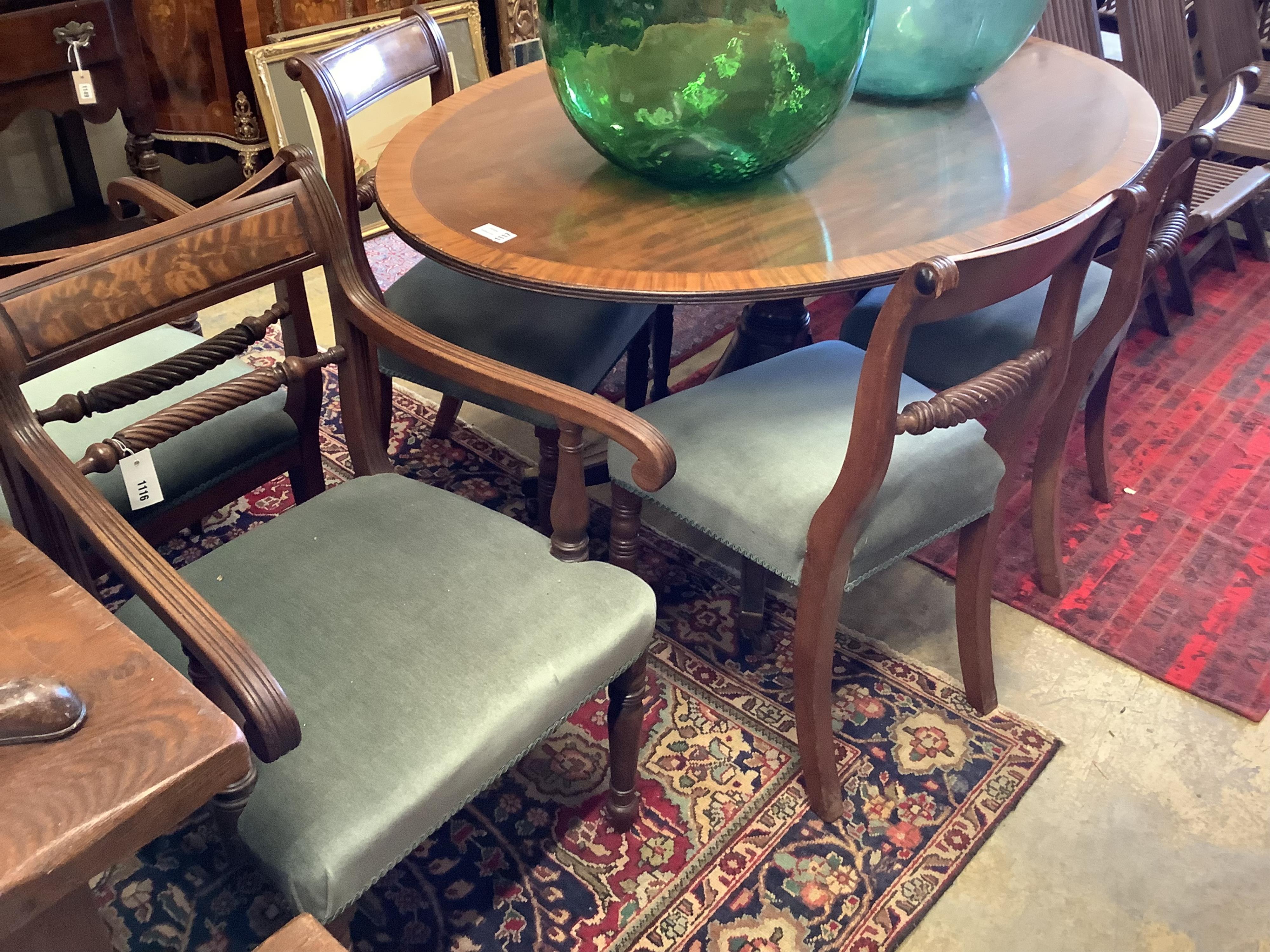 An associated set of six 19th century dining chairs in the Regency style, two with arms